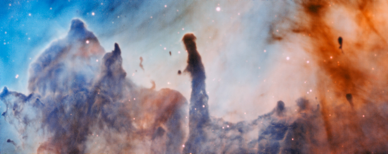 The massive stars within this region slowly destroy the pillars of dust and gas from which they are born. (Image: ESO/A. McLeod)